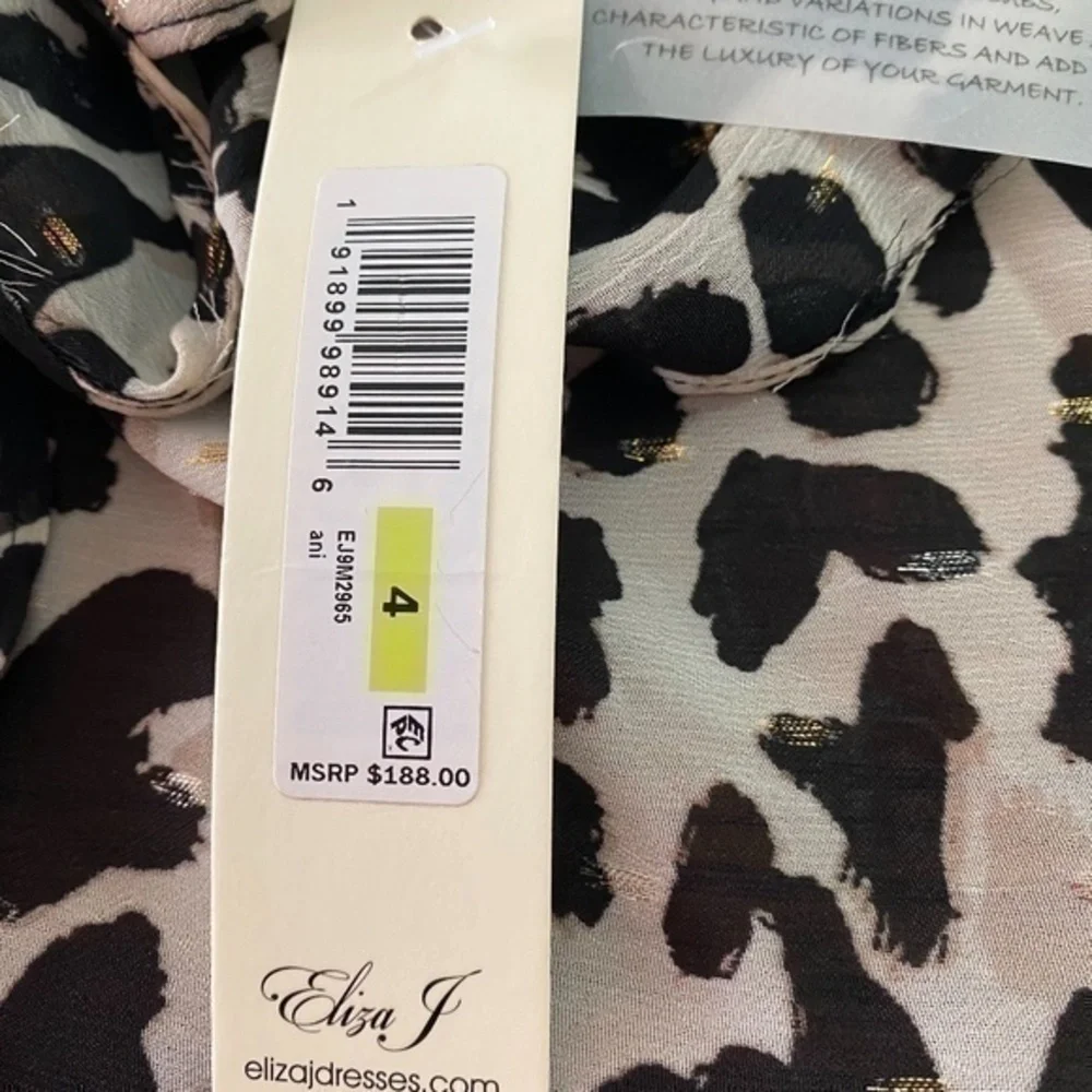 Eliza J Leopard Asymmetrical Skirt Size 4 NWT